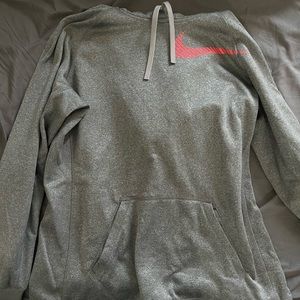 Grey Nike hoodie with neon orange swoosh, size M